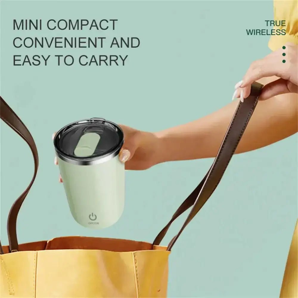Automatic self stirring mug being placed into a bag, emphasizing its compact and convenient design.