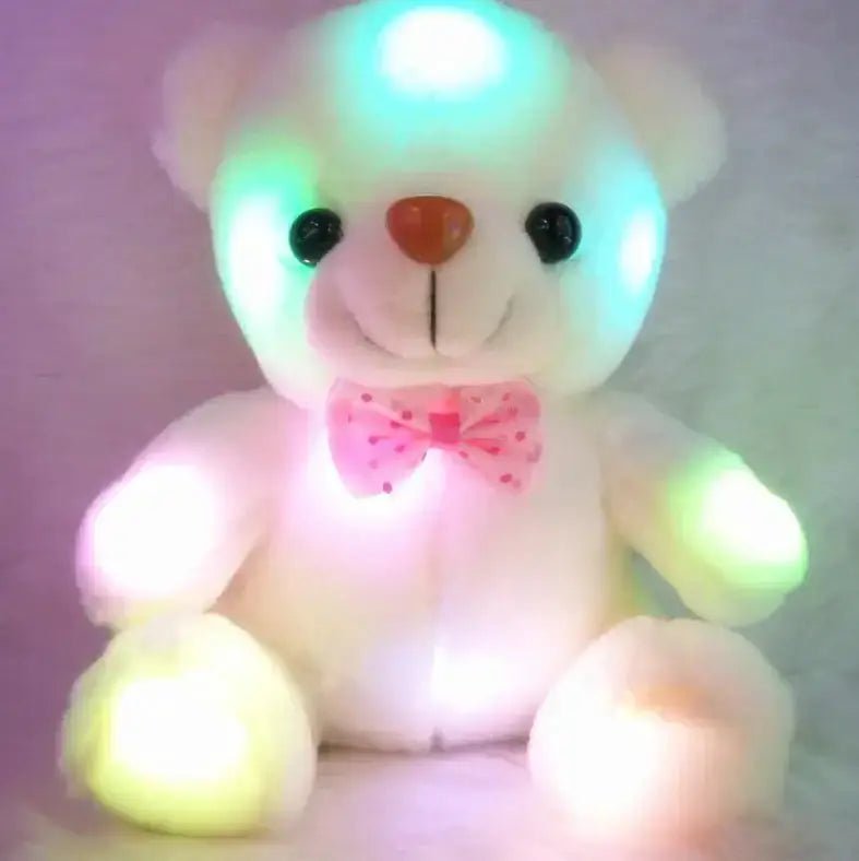 Colorful glowing teddy bear with soft LED lights and a pink bow tie for children’s comfort and joy.